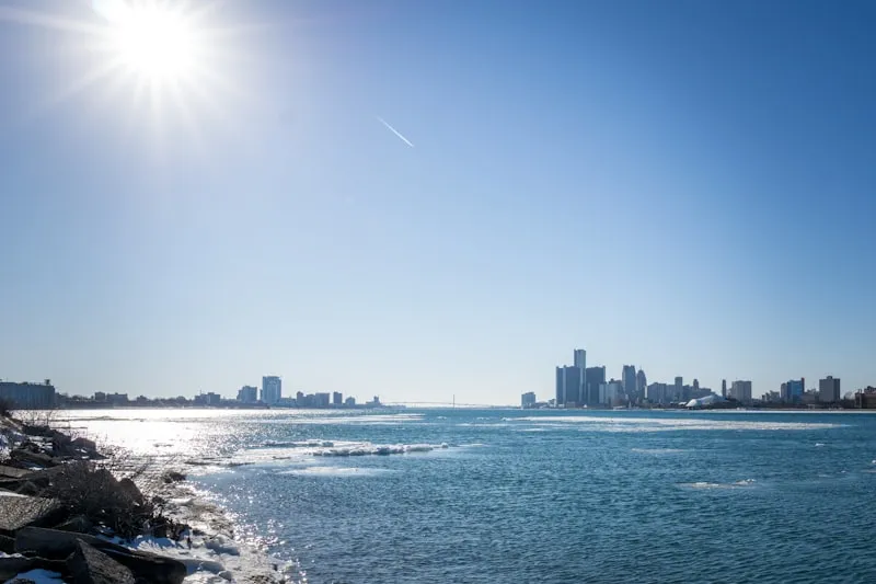 Detroit skyline across the frozen river - opening a sober living home in Michigan